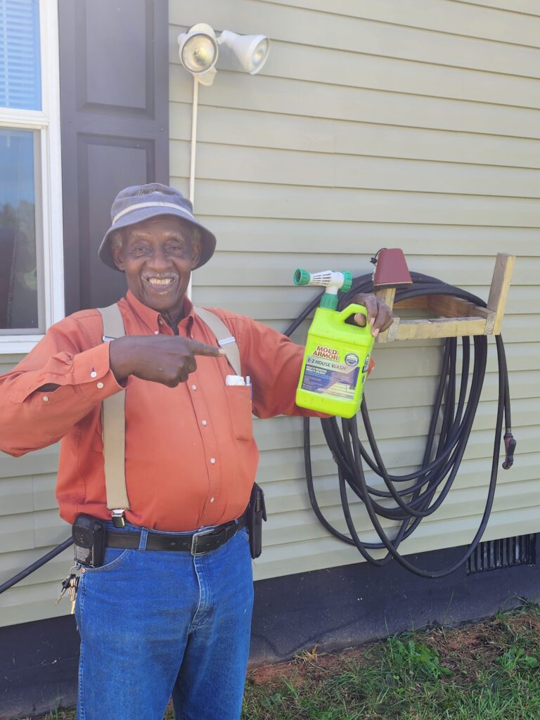 dad after cleaning of Vinyl siding